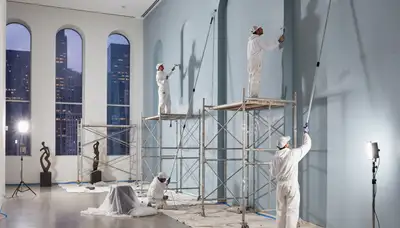 Commercial painting team in Oak Park, IL painting an active business property exterior